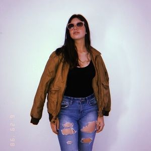 Brown leather jacket slightly damaged